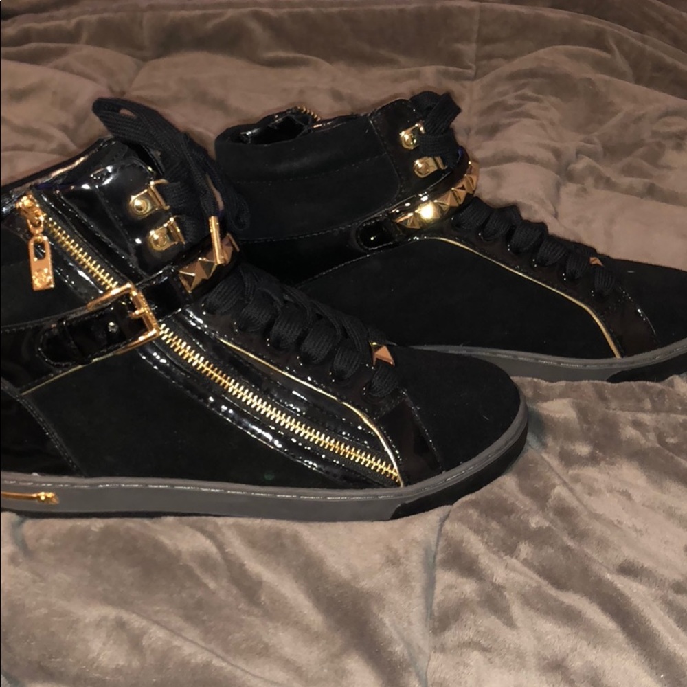 Michael Kors black and gold high top sneakers